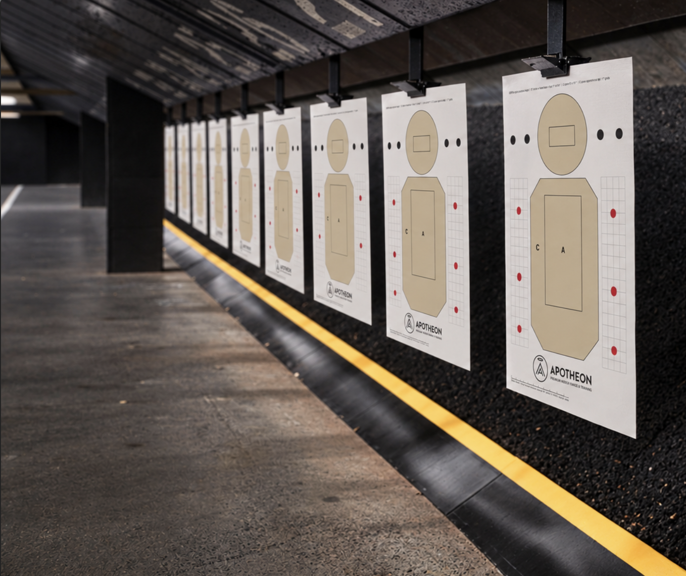 Rows of custom paper targets at an indoor shooting range